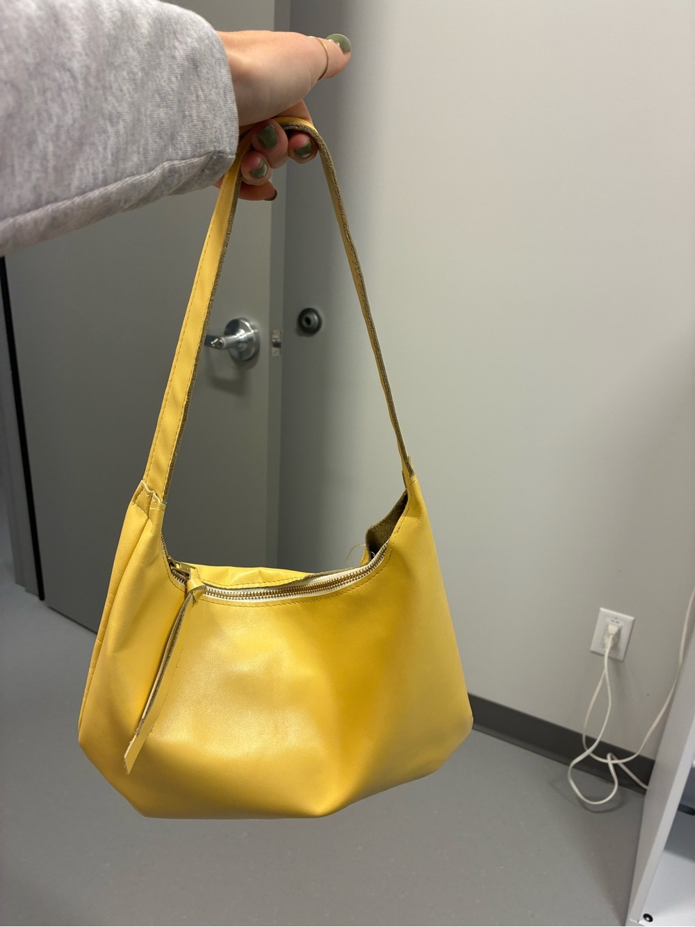Handmade Julie Neufeld “bruna shoulder bag” in butter yellow.